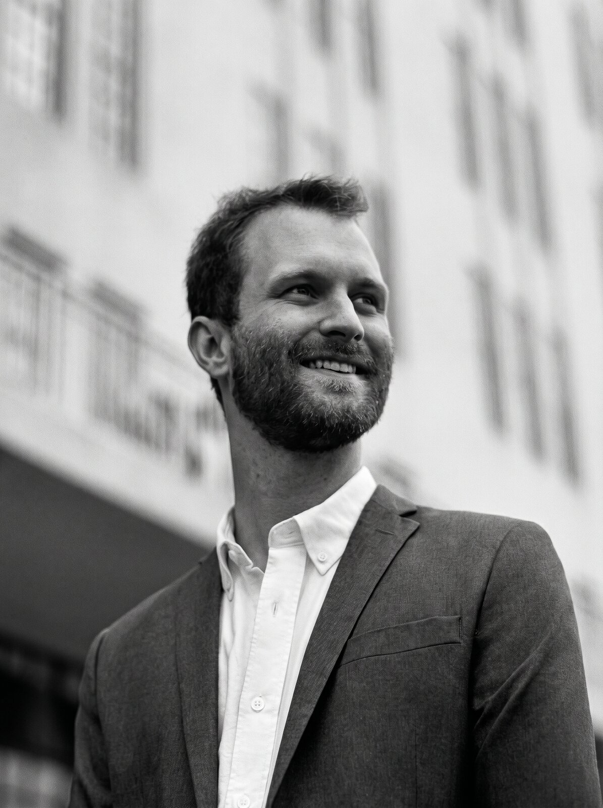 Ryan Hooks — founder of Proto™, operator portrait with astronaut utility pack and Hooks + Gebhardt lineage regalia